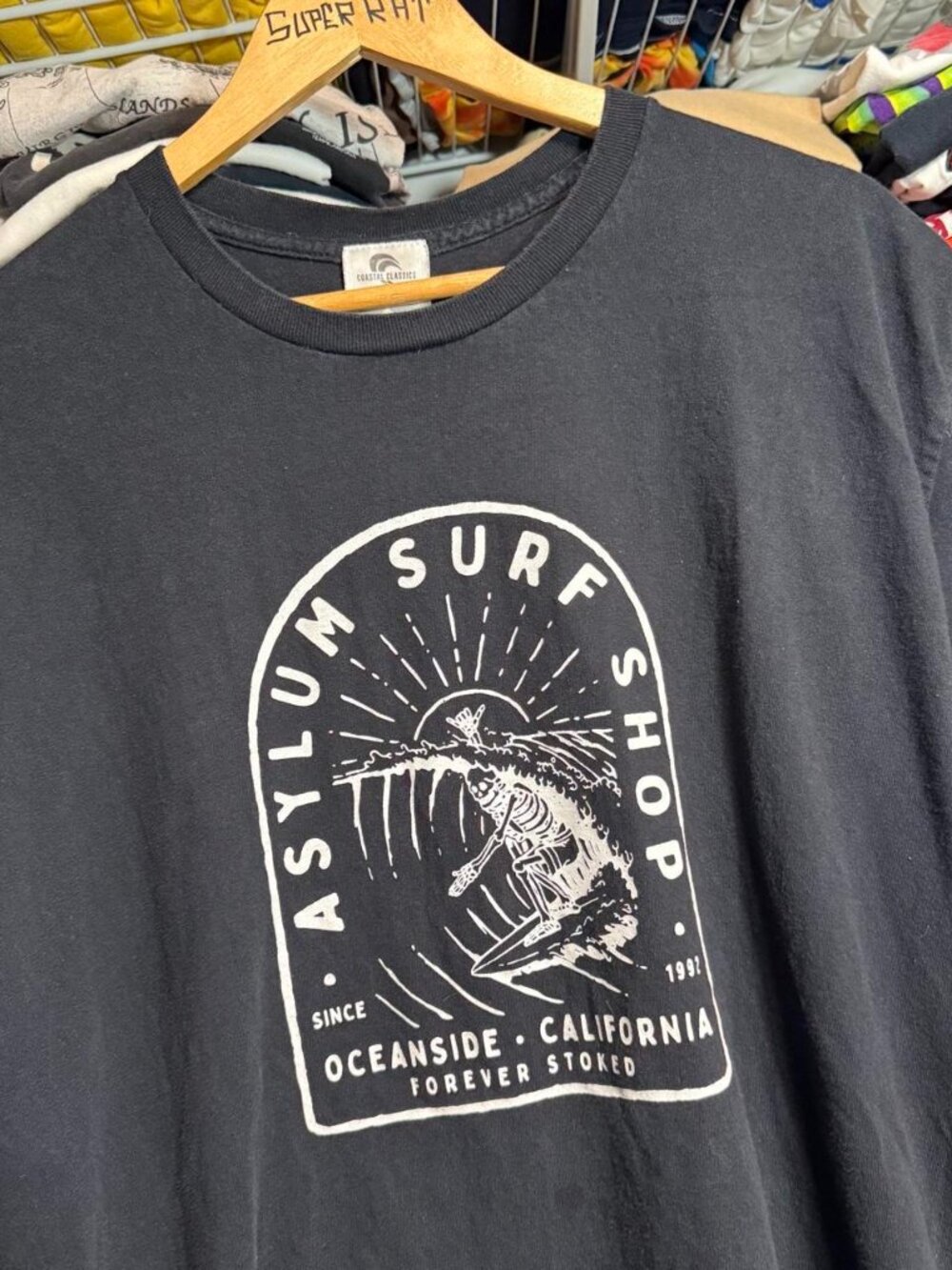 Asylum surf shop Oceanside California skeleton surfing graphic t shirt black